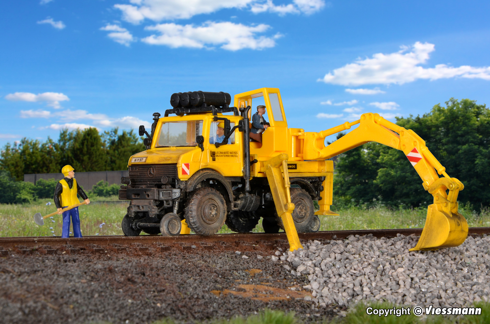 16307 MB Unimog Zweiwege m. Heckbagger