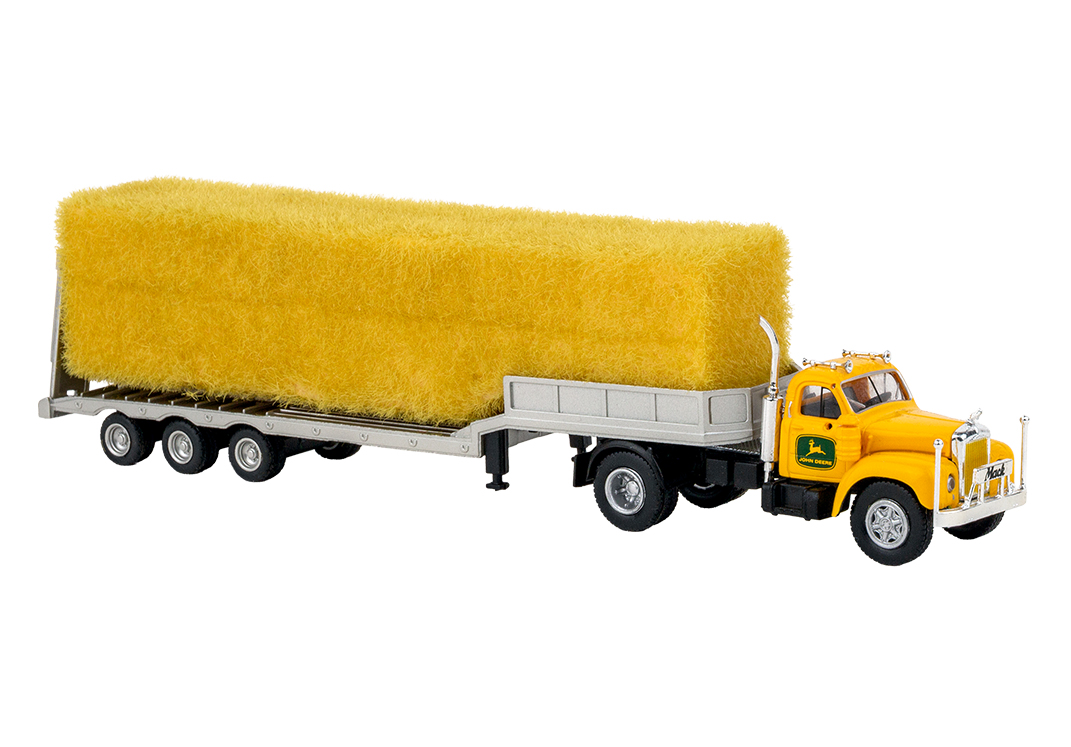 85984 Mack B61 mit beladenem Tieflader gelb