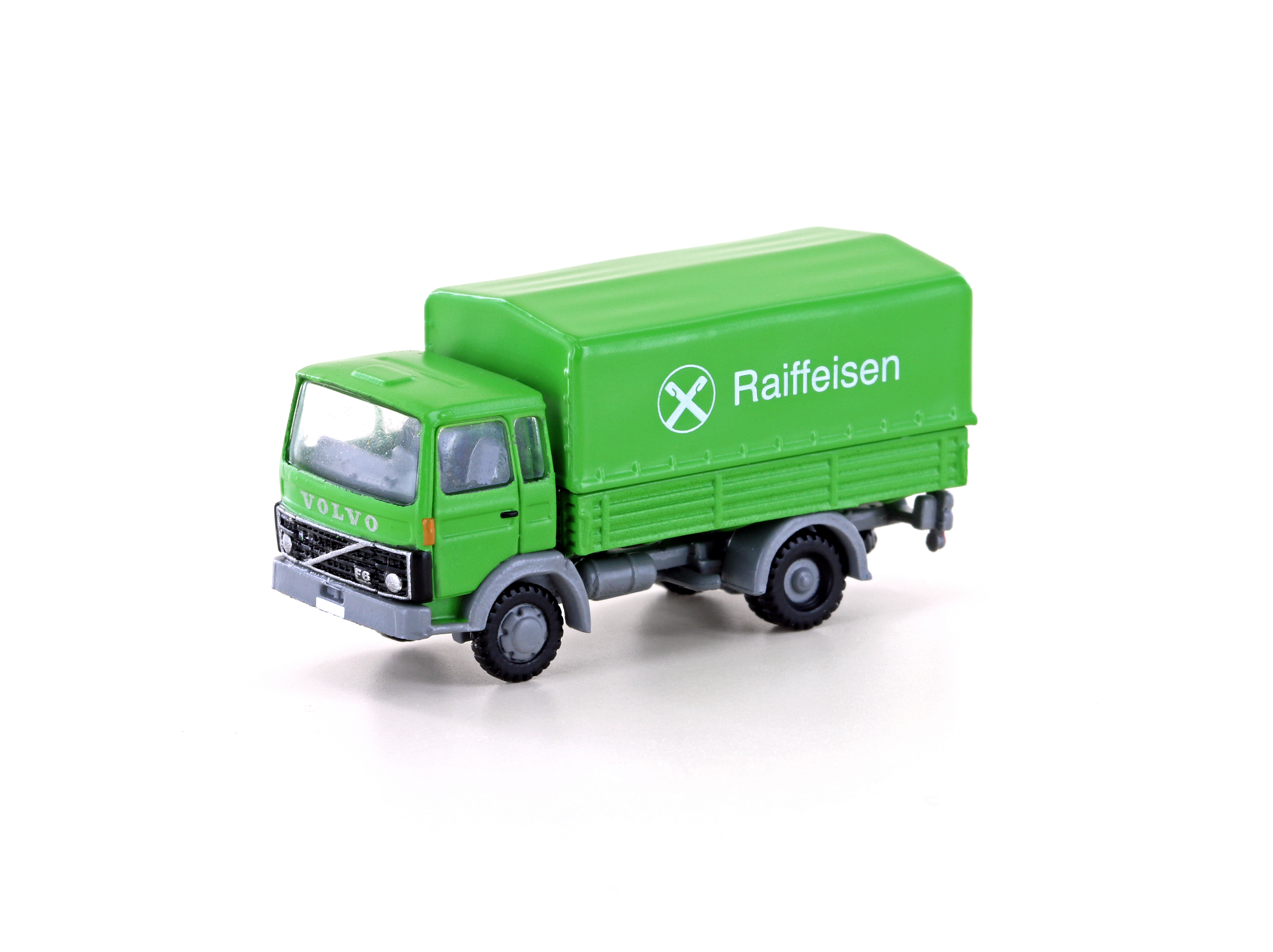 4882 Volvo F4/6 mit Pritsche/Plane Raiffeis