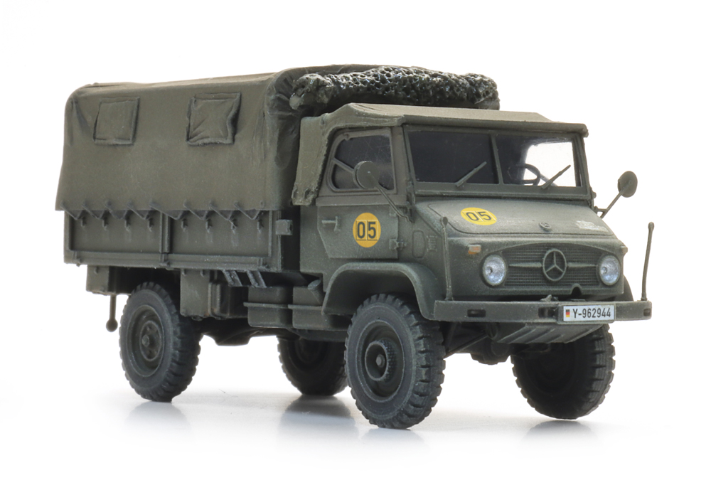 6870776 BRD Unimog 404s Pritsche Plane gelboliv