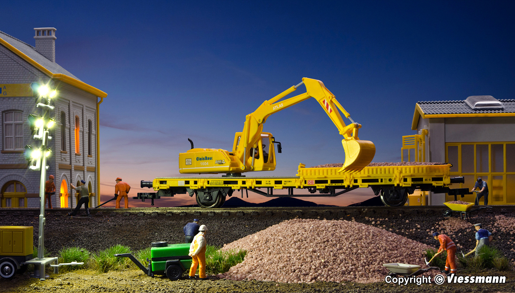 Kibri 26250 Niederbordwagen mit Atlas Bagger