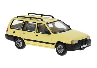 Brekina PCX871457 Opel Kadett E Caravan hellgelb (1985) 